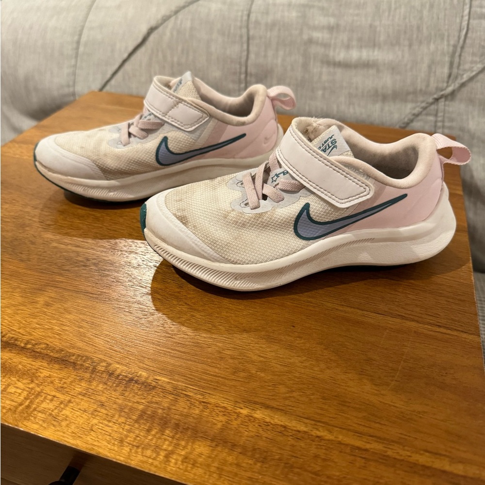 Nike Star Runner sneakers. Size 11c. Pink and white.